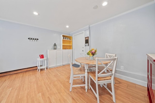 79 Fountain Unit 5, Weymouth, MA 02190 - dining area with light wood-style floors, recessed lighting, baseboards, a baseboard radiator, and ornamental molding