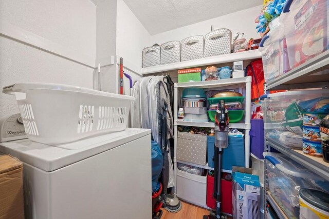 79 Fountain Unit 5, Weymouth, MA 02190 - laundry room with washer / dryer, laundry area, and wood finished floors