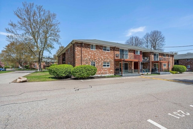 79 Fountain Unit 5, Weymouth, MA 02190 - view of building exterior featuring uncovered parking