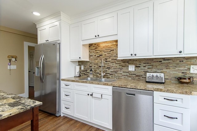 191 Providence St, Putnam, CT 06260 - kitchen with stainless steel appliances, wood finished floors, white cabinets, tasteful backsplash, and recessed lighting