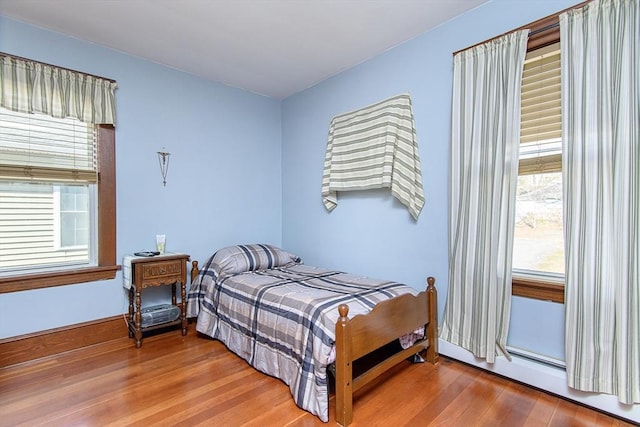 191 Providence St, Putnam, CT 06260 - bedroom with multiple windows and wood finished floors
