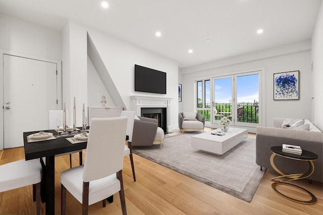 2 Clarendon St Unit 510, Boston, MA 02116 - living area with light wood-style flooring, a fireplace, and recessed lighting