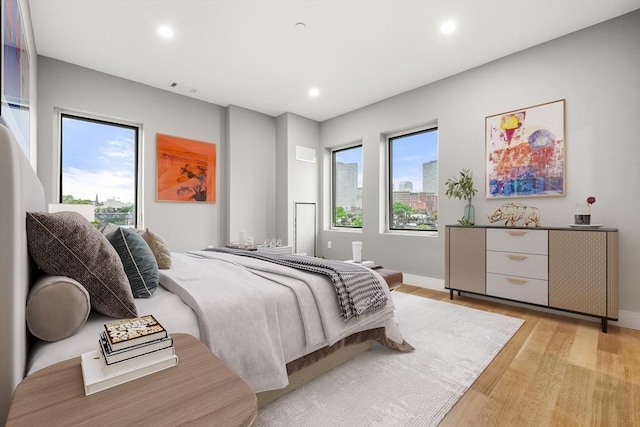 2 Clarendon St Unit 510, Boston, MA 02116 - bedroom with light wood-style flooring, recessed lighting, and baseboards