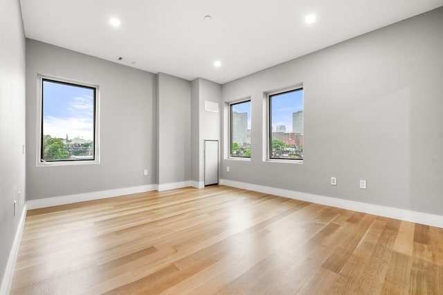 2 Clarendon St Unit 510, Boston, MA 02116 - unfurnished room with healthy amount of natural light, light wood finished floors, baseboards, and recessed lighting