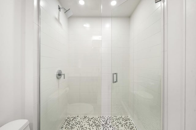 2 Clarendon St Unit 510, Boston, MA 02116 - full bathroom featuring toilet, a stall shower, and recessed lighting