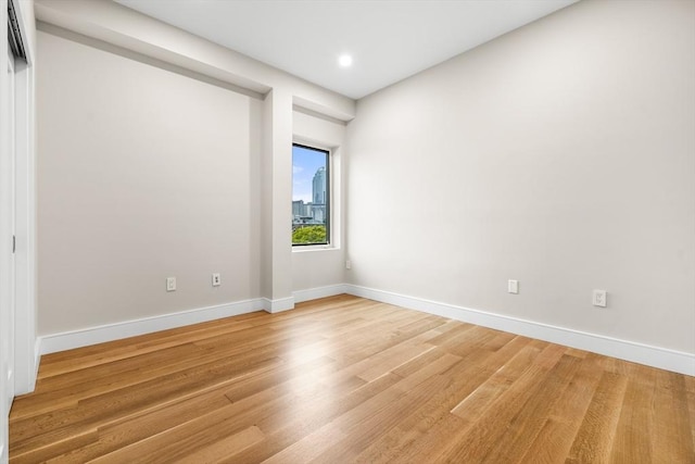 2 Clarendon St Unit 510, Boston, MA 02116 - empty room with light wood-style flooring, baseboards, and recessed lighting