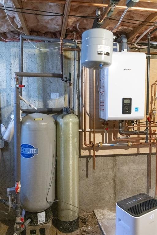 utility room featuring water heater