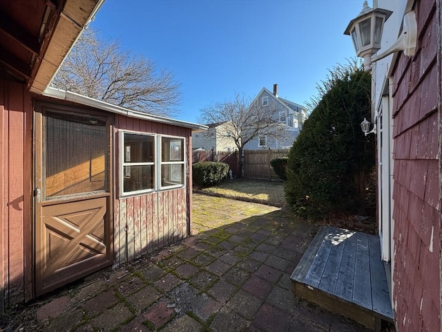 view of patio / terrace with a storage unit