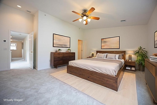 140 Commonwealth Ave Unit 38, North Attleboro, MA 02763 - bedroom with light carpet, baseboards, and ceiling fan