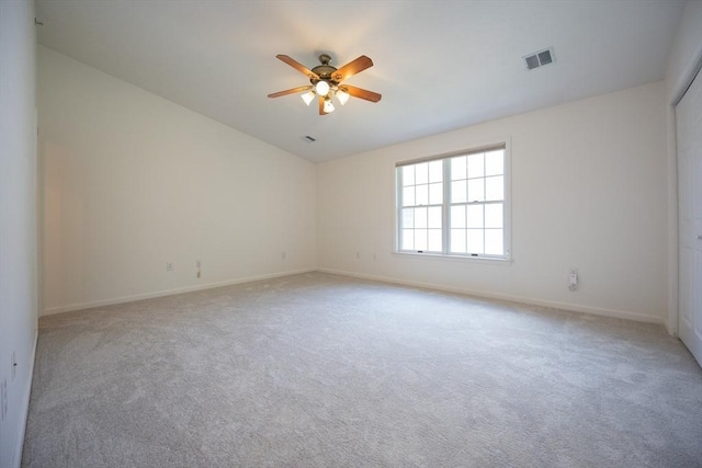 140 Commonwealth Ave Unit 38, North Attleboro, MA 02763 - empty room with a ceiling fan, light colored carpet, lofted ceiling, and baseboards