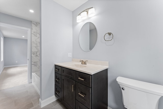 full bathroom with tile patterned floors, vanity, tub / shower combination, and toilet