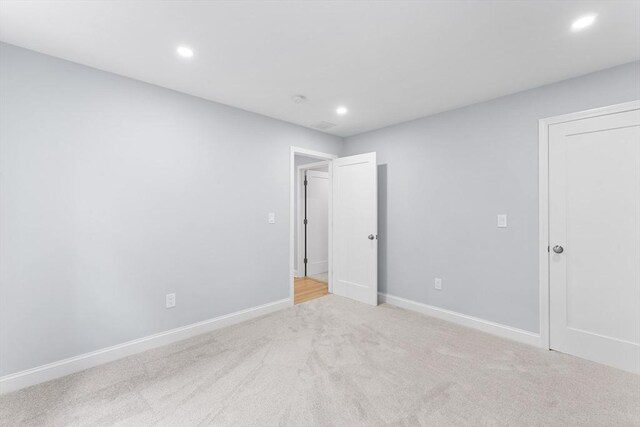 full bathroom with tile patterned floors, tiled shower / bath, vanity, and toilet