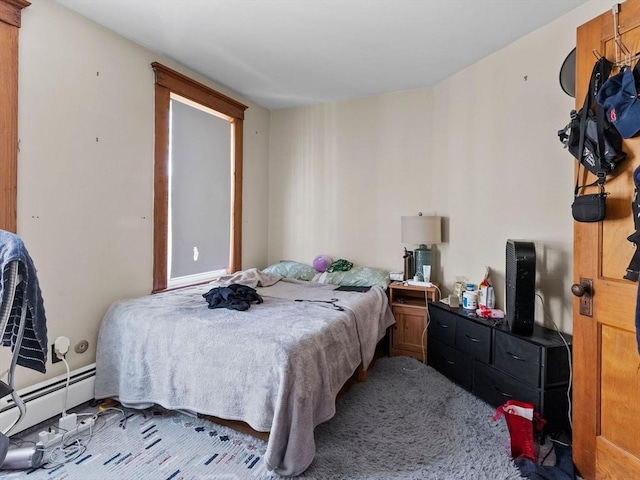 bedroom with a baseboard radiator