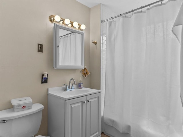 full bath featuring toilet, shower / bath combo, and vanity