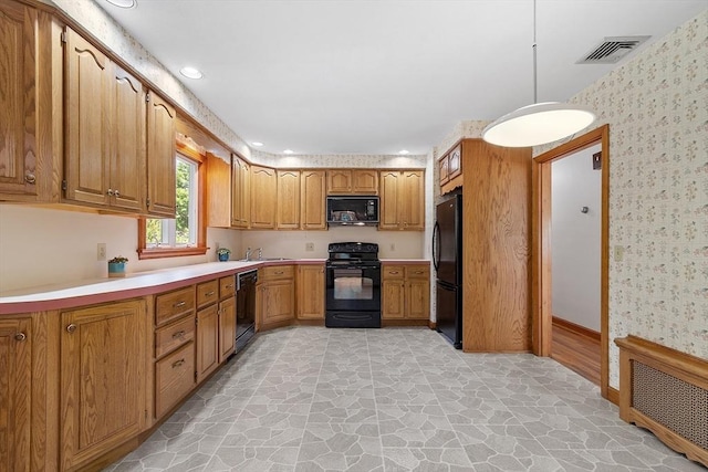 15 Greenbrook Rd, Hamilton, MA 01982 - kitchen featuring black appliances, wallpapered walls, light countertops, brown cabinets, and recessed lighting