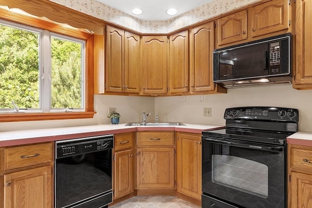 15 Greenbrook Rd, Hamilton, MA 01982 - kitchen with black appliances, light countertops, brown cabinetry, and light tile patterned floors