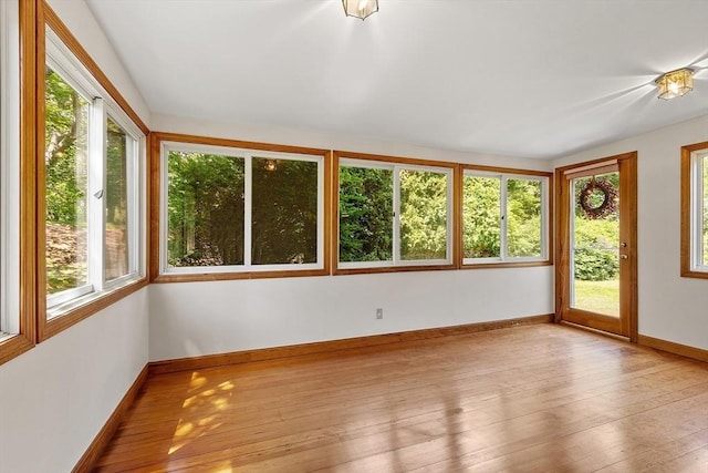 15 Greenbrook Rd, Hamilton, MA 01982 - unfurnished sunroom featuring plenty of natural light, wood-type flooring, and a wooden deck