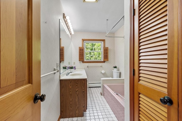 15 Greenbrook Rd, Hamilton, MA 01982 - full bath featuring a baseboard radiator, a bath, and vanity