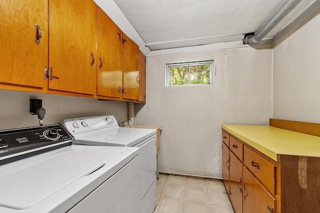 15 Greenbrook Rd, Hamilton, MA 01982 - laundry room featuring cabinet space, separate washer and dryer, light floors, and a textured ceiling