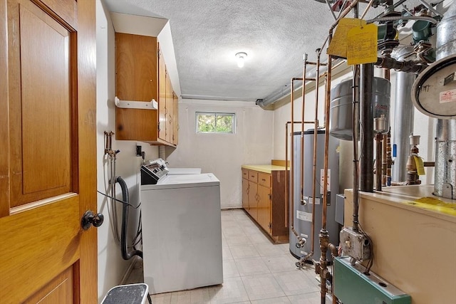 15 Greenbrook Rd, Hamilton, MA 01982 - washroom with cabinet space, water heater, independent washer and dryer, and a textured ceiling