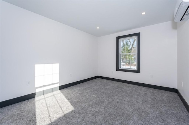 carpeted empty room featuring a wall mounted air conditioner