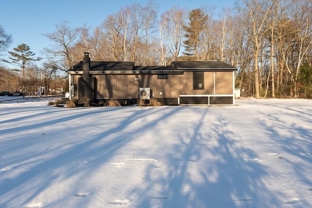 view of snow covered house