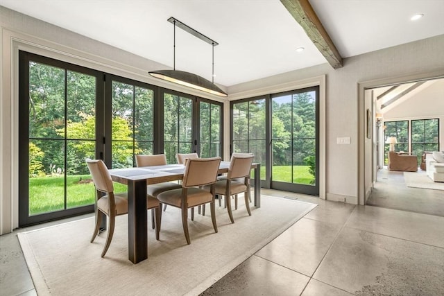 sunroom with baseboards, recessed lighting, and beam ceiling