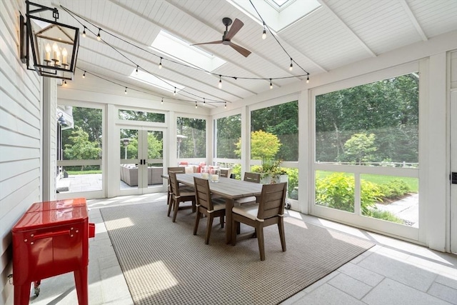 sunroom / solarium with french doors and a skylight