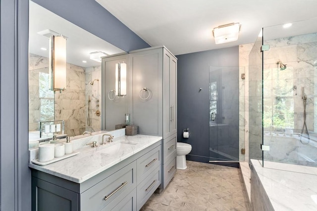 bathroom with a shower stall, recessed lighting, vanity, and toilet