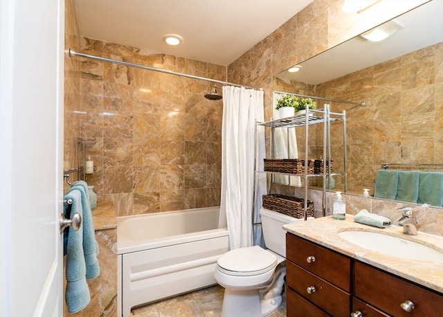 full bathroom featuring tile walls, shower / tub combo, vanity, and toilet