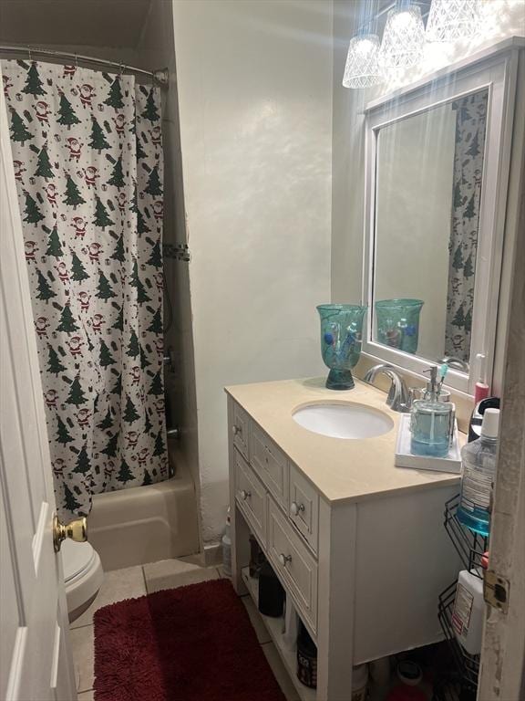 full bathroom featuring vanity, shower / bath combination with curtain, tile patterned floors, and toilet