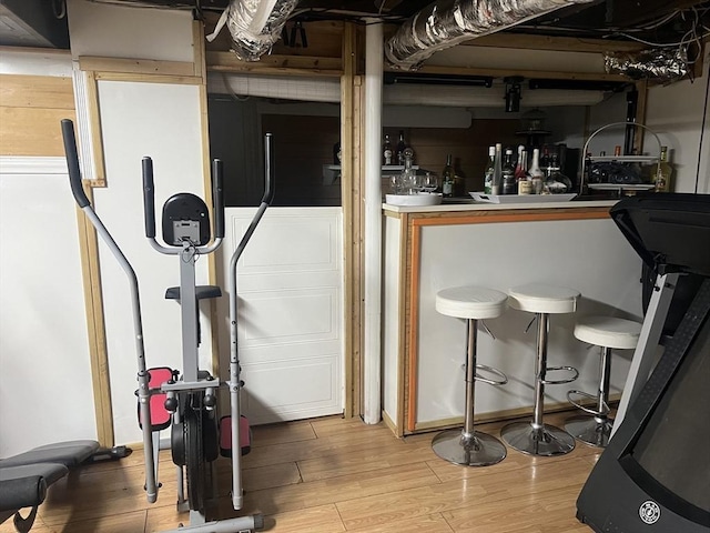 workout area featuring light hardwood / wood-style flooring