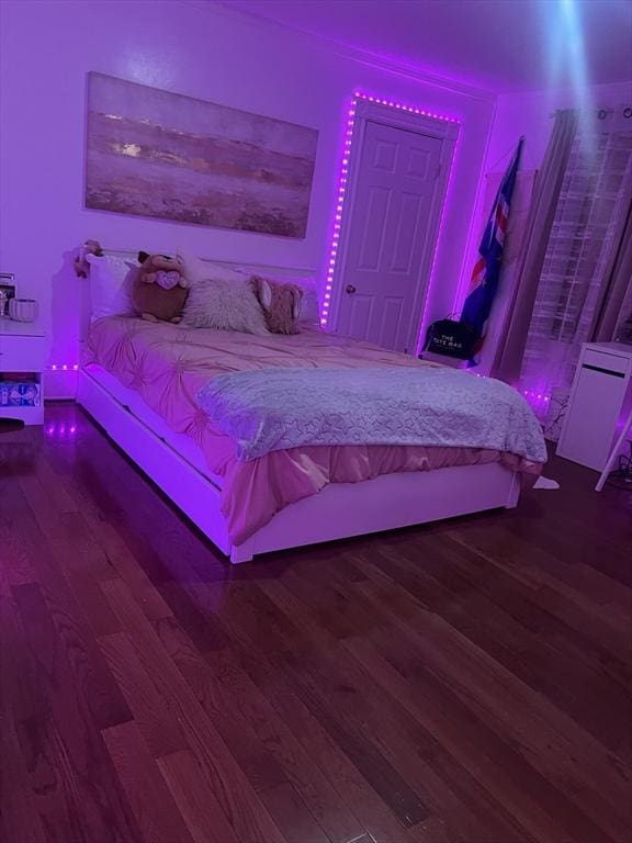 unfurnished bedroom featuring wood-type flooring