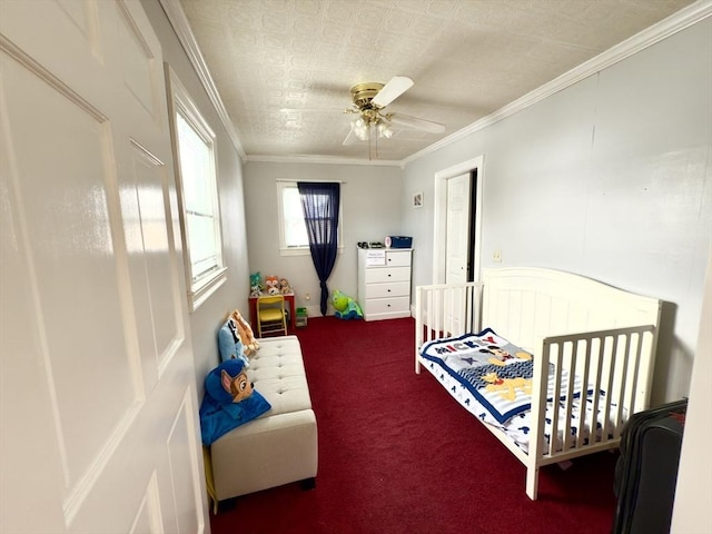 bedroom with a ceiling fan, dark colored carpet, and crown molding