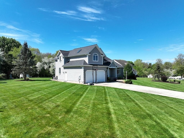 view of side of property with concrete driveway, a lawn, and an attached garage