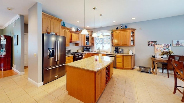 kitchen featuring stainless steel appliances, a sink, light stone counters, light tile patterned flooring, and recessed lighting