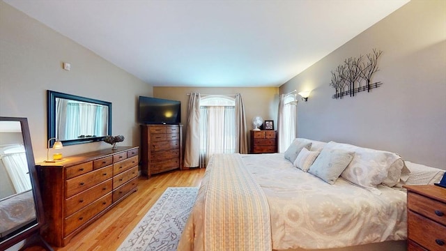 bedroom with light wood-style flooring