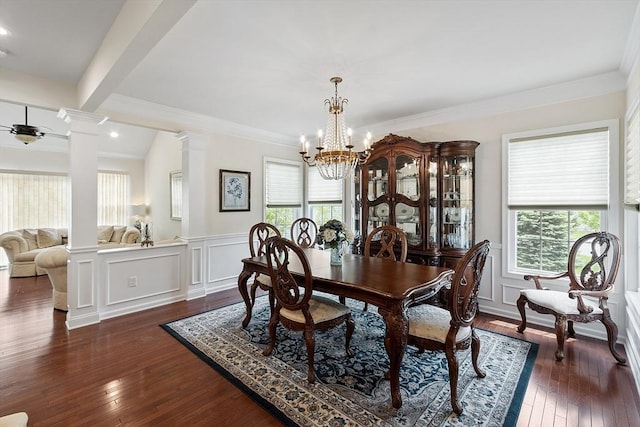 123 Skyline Dr Unit 123, Acton, MA 01720 - dining space featuring decorative columns, a chandelier, a wainscoted wall, dark wood-style flooring, and a decorative wall