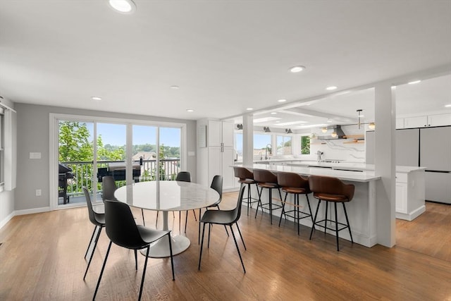 21 Glenley Ter, Boston, MA 02135 - dining area with healthy amount of natural light, light wood-type flooring, and recessed lighting