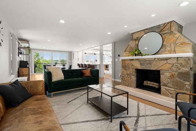 21 Glenley Ter, Boston, MA 02135 - living area with wood finished floors, recessed lighting, and a fireplace