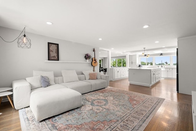 21 Glenley Ter, Boston, MA 02135 - living room with light wood-style floors and recessed lighting