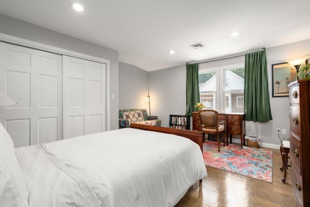 21 Glenley Ter, Boston, MA 02135 - bedroom with wood finished floors, a closet, and recessed lighting