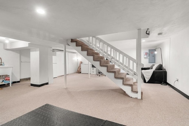 21 Glenley Ter, Boston, MA 02135 - finished basement featuring carpet flooring, electric panel, and stairway