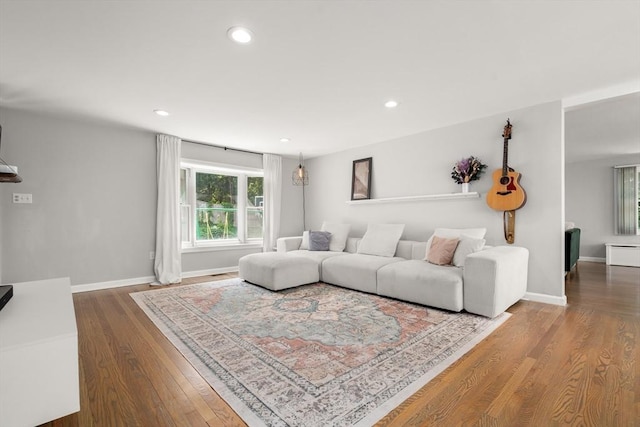 21 Glenley Ter, Boston, MA 02135 - living area with recessed lighting and wood finished floors
