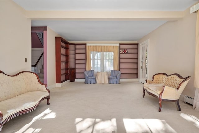 41 Bulkley, Williamstown, MA 01267 - living area featuring carpet floors, stairway, and a baseboard radiator