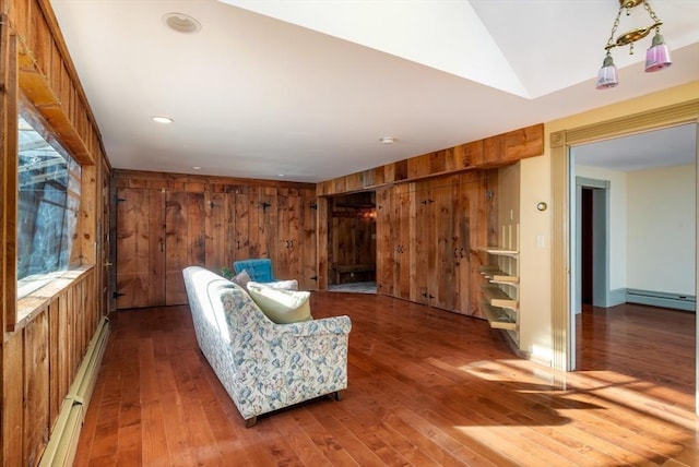 41 Bulkley, Williamstown, MA 01267 - living room with wooden walls, wood-type flooring, baseboard heating, and vaulted ceiling