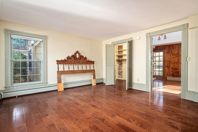 41 Bulkley, Williamstown, MA 01267 - empty room with wood finished floors, baseboard heating, and baseboards
