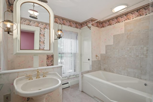 41 Bulkley, Williamstown, MA 01267 - bathroom with a baseboard radiator, a tub to relax in, a sink, and wallpapered walls