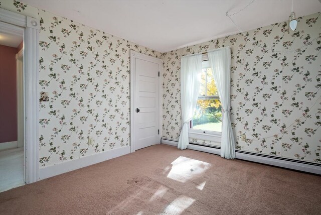 41 Bulkley, Williamstown, MA 01267 - carpeted empty room featuring wallpapered walls and a baseboard radiator