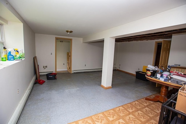 166 Fairview Ave, Rehoboth, MA 02769 - finished below grade area featuring a baseboard radiator, tile patterned floors, and baseboards